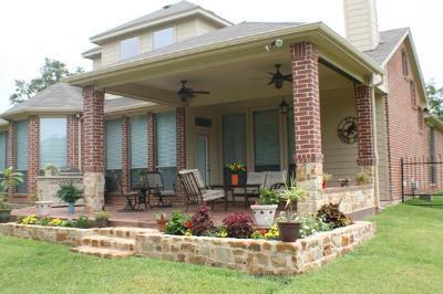 covered patio with brick columns 